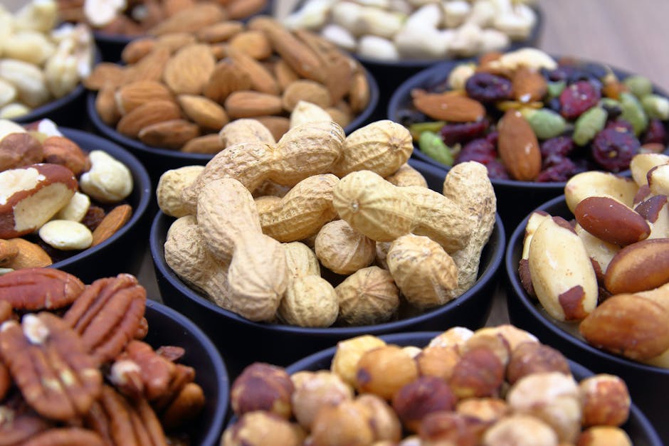 A variety of nuts and seeds displayed in bowls highlighting diversity and health benefits.